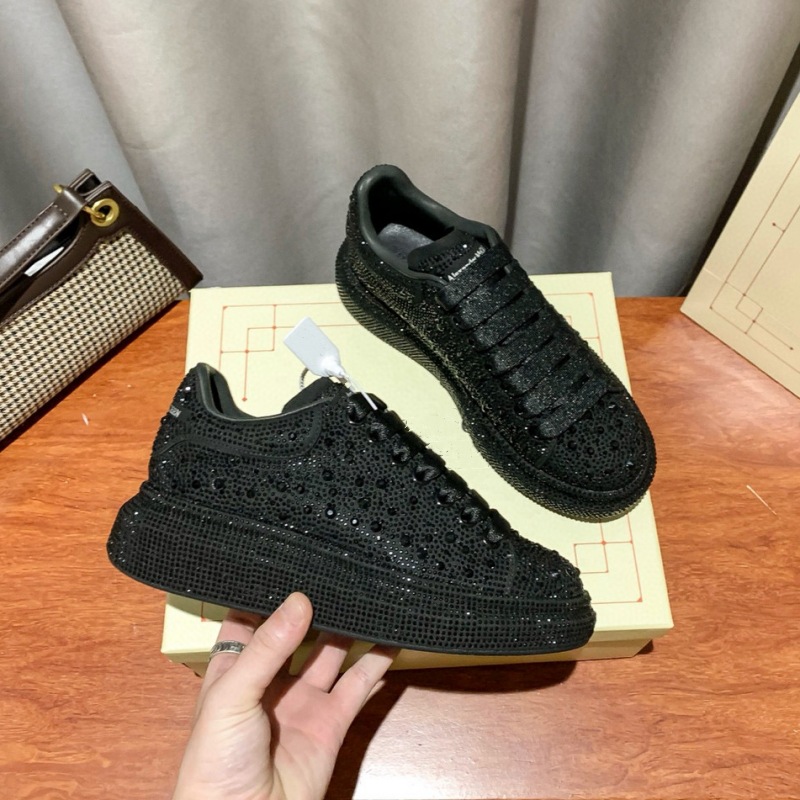 Rhinestone-encrusted, black diamond star-style platform sneakers for couples, made with genuine cowhide leather, featuring a chunky sole and a “graffiti mcqueen” design