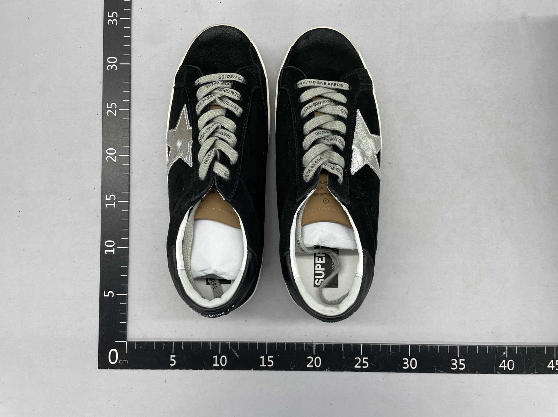 Classic and versatile korean gg style distressed star sneakers for women and men. these low-top sneakers feature a hidden wedge for added height and a trendy, slightly dirty, cowhide leather finish. perfect as everyday white sneakers 6