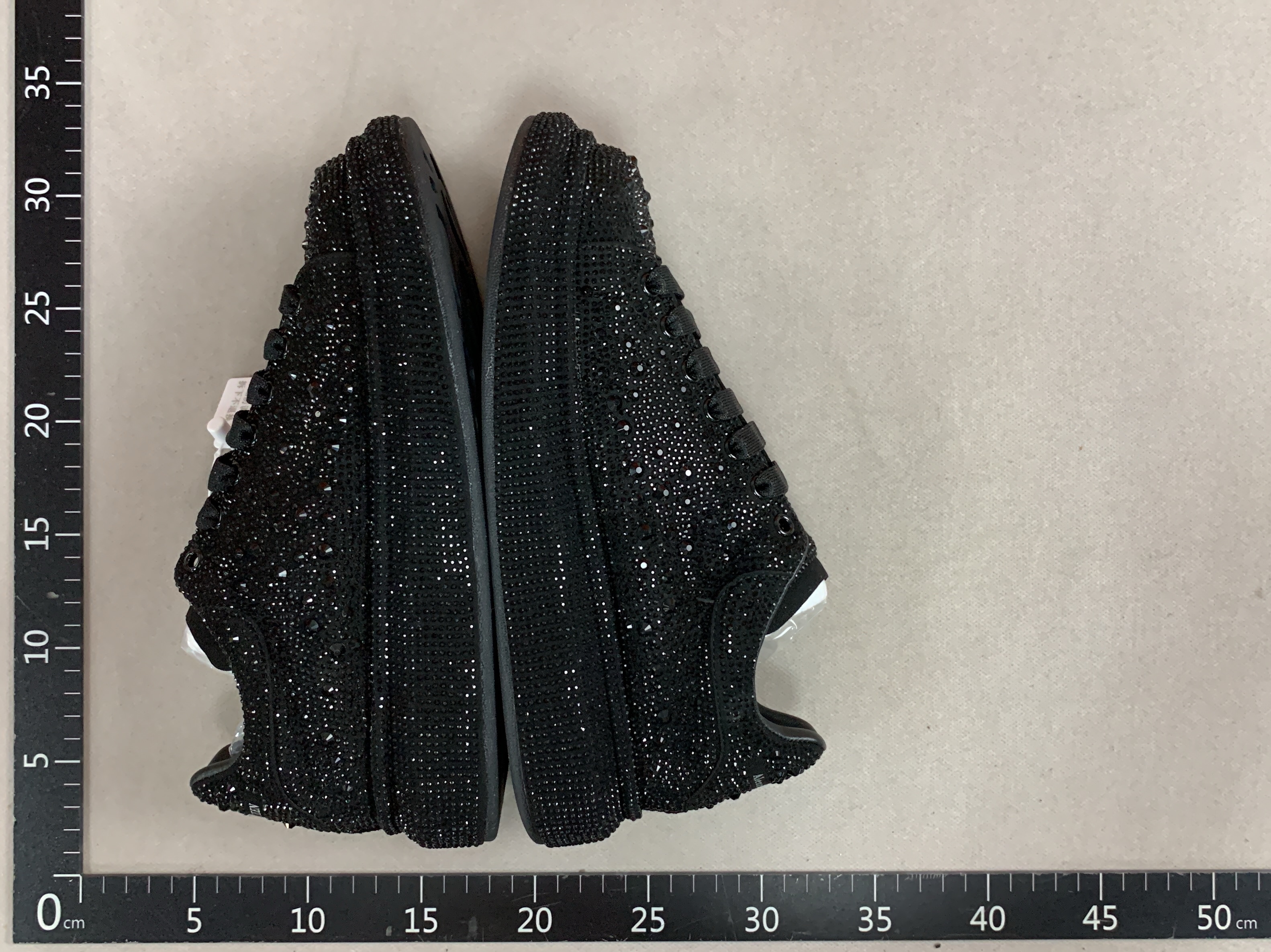Rhinestone-encrusted, black diamond star-style platform sneakers for couples, made with genuine cowhide leather, featuring a chunky sole and a “graffiti mcqueen” design 3