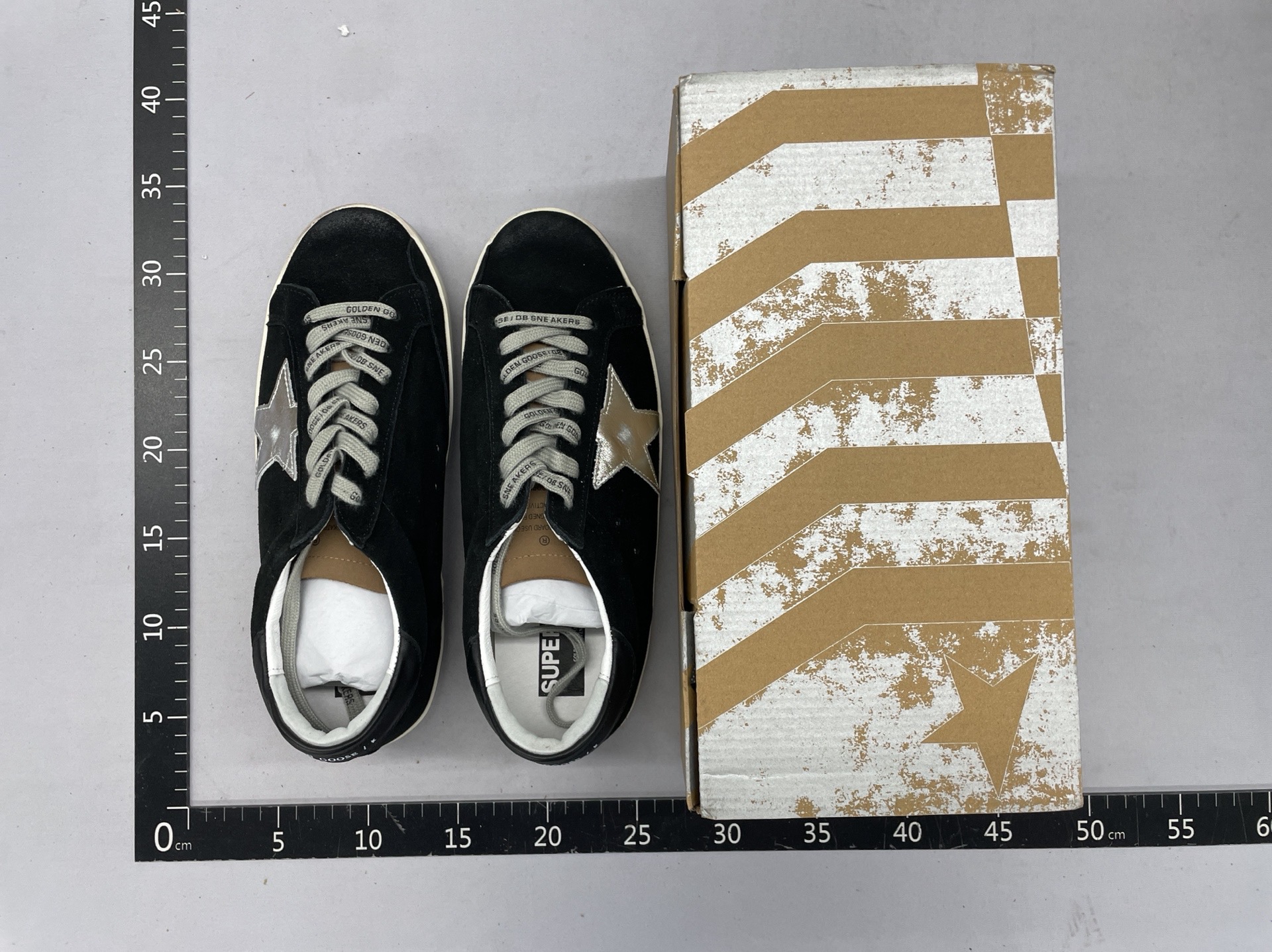 Classic and versatile korean gg style distressed star sneakers for women and men. these low-top sneakers feature a hidden wedge for added height and a trendy, slightly dirty, cowhide leather finish. perfect as everyday white sneakers 7